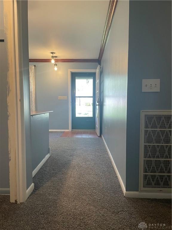 928 Shady Ln, Beavercreek, OH 45434 - hallway with ornamental molding, carpet floors, and baseboards