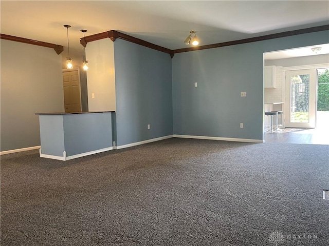 928 Shady Ln, Beavercreek, OH 45434 - unfurnished room with ornamental molding, baseboards, and dark colored carpet