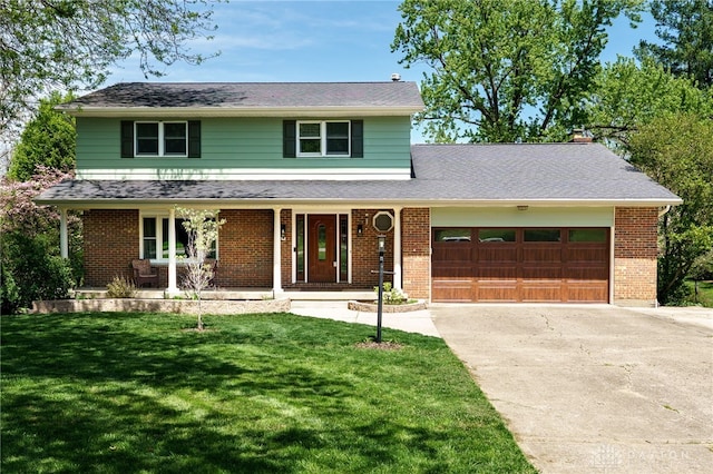 traditional-style home with driveway, covered porch, a front yard, an attached garage, and brick siding