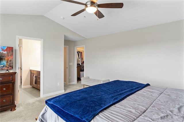 1621 Stonebury Ct, Xenia, OH 45385 - bedroom featuring vaulted ceiling, light colored carpet, a spacious closet, baseboards, and connected bathroom