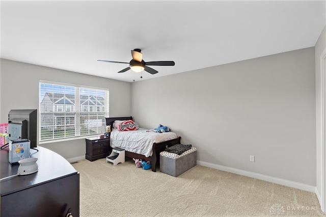 1621 Stonebury Ct, Xenia, OH 45385 - bedroom with baseboards, carpet floors, and ceiling fan