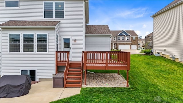 1621 Stonebury Ct, Xenia, OH 45385 - rear view of property with a yard, a deck, a shingled roof, and a residential view