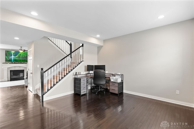 1621 Stonebury Ct, Xenia, OH 45385 - office area featuring wood finished floors, baseboards, a fireplace, and recessed lighting