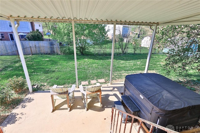 view of patio with grilling area and a fenced backyard