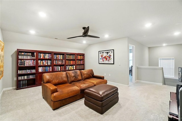 living room featuring recessed lighting, baseboards, ceiling fan, and light carpet