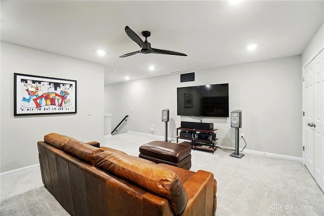 living room with recessed lighting, a ceiling fan, baseboards, and light carpet