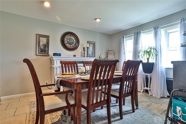 dining space with baseboards