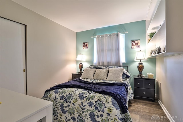 509 Hamilton Ave, New Carlisle, OH 45344 - bedroom with wood finished floors and baseboards