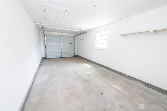 garage featuring baseboards