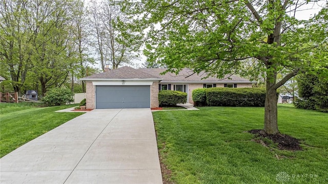 ranch-style home with a front yard, a chimney, brick siding, concrete driveway, and an attached garage