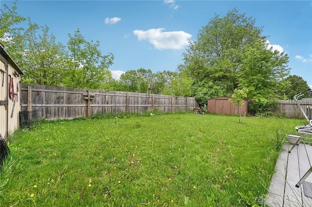 1015 Colorado Dr, Xenia, OH 45385 - view of yard with a storage unit and an outdoor structure