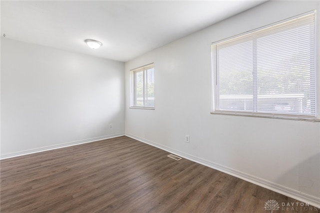 5675 E Coach Dr Unit B, Kettering, OH 45440 - spare room featuring wood finished floors and baseboards