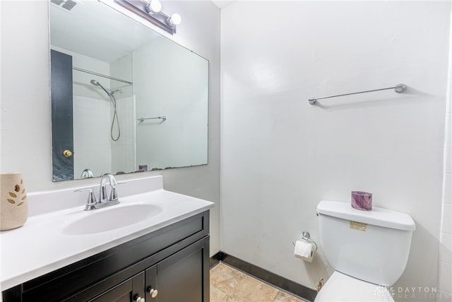 5675 E Coach Dr Unit B, Kettering, OH 45440 - bathroom featuring toilet, vanity, and a shower