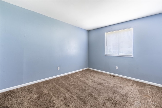 5675 E Coach Dr Unit B, Kettering, OH 45440 - spare room with carpet floors and baseboards