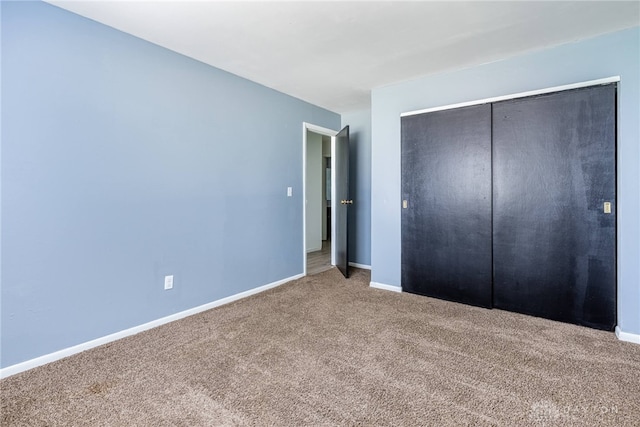 5675 E Coach Dr Unit B, Kettering, OH 45440 - unfurnished bedroom with carpet, a closet, and baseboards
