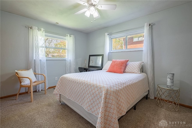 4600 Wing View Ln, Kettering, OH 45429 - bedroom featuring multiple windows, baseboards, and carpet