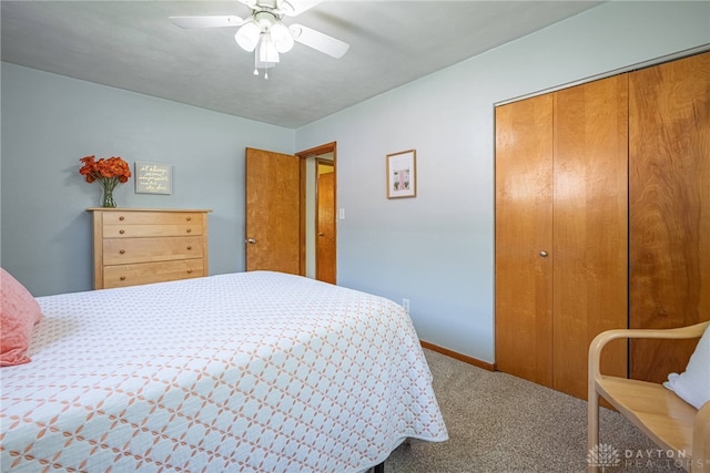 4600 Wing View Ln, Kettering, OH 45429 - carpeted bedroom with a closet, ceiling fan, and baseboards