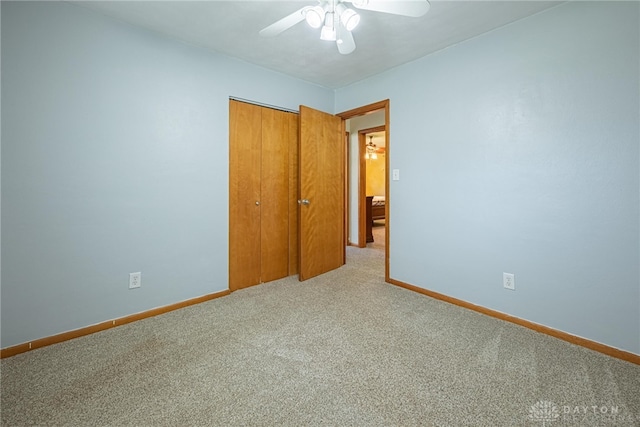 4600 Wing View Ln, Kettering, OH 45429 - unfurnished bedroom with carpet, baseboards, a closet, and ceiling fan