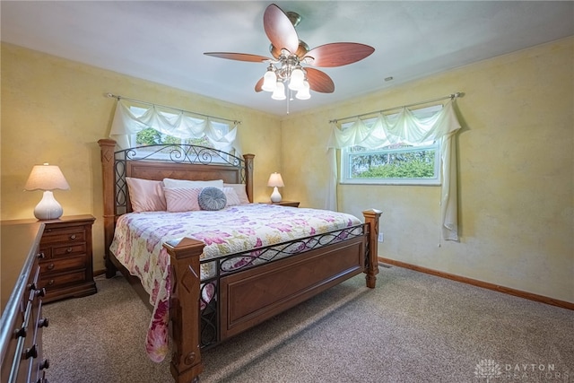 4600 Wing View Ln, Kettering, OH 45429 - bedroom with carpet floors, a ceiling fan, and baseboards