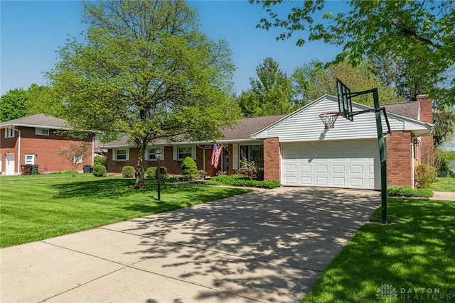 4600 Wing View Ln, Kettering, OH 45429 - ranch-style home with a garage, a front lawn, brick siding, and concrete driveway