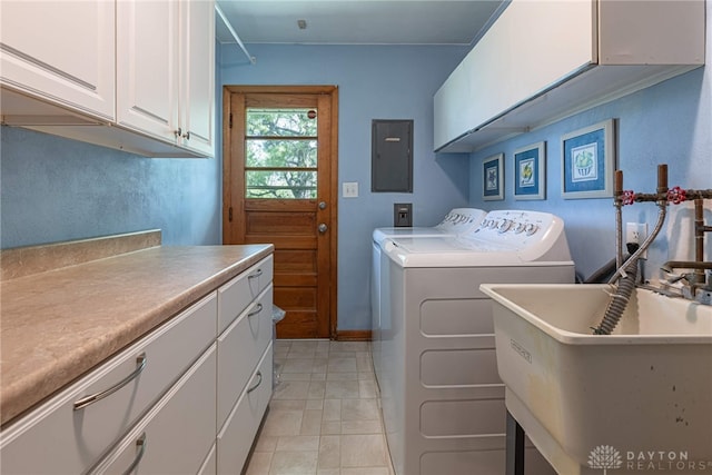 4600 Wing View Ln, Kettering, OH 45429 - clothes washing area featuring cabinet space, electric panel, and washing machine and dryer