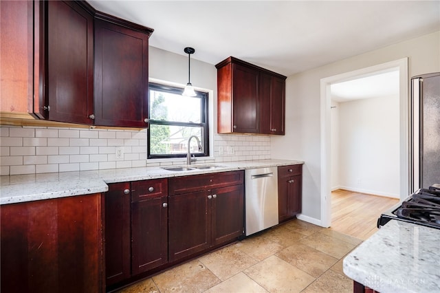 kitchen featuring stainless steel dishwasher, light stone countertops, reddish brown cabinets, tasteful backsplash, and a sink