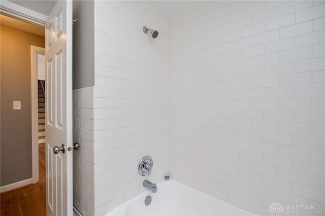 full bathroom with shower / tub combination and wood finished floors