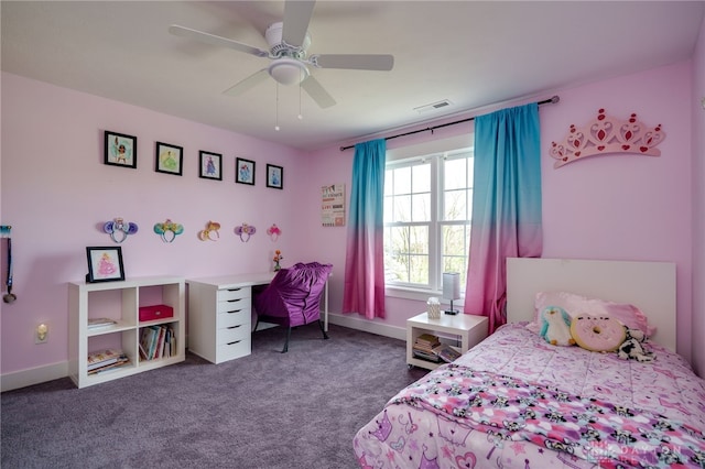 carpeted bedroom with baseboards, a ceiling fan, and visible vents