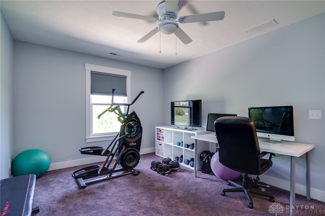 home office with visible vents, carpet flooring, and baseboards