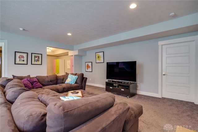 carpeted living area with baseboards, recessed lighting, and a textured ceiling