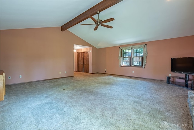 unfurnished living room featuring carpet floors, a ceiling fan, baseboards, and lofted ceiling with beams