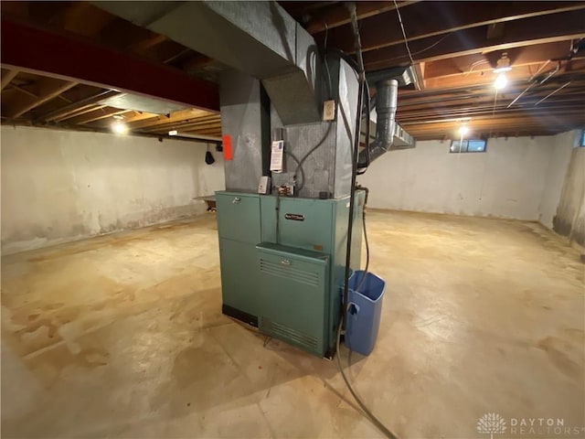 unfinished basement with heating unit