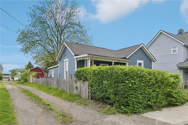 1566 Cora St, Springfield, OH 45503 - view of property exterior featuring roof with shingles