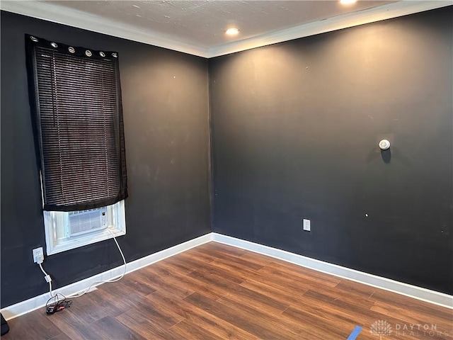 1566 Cora St, Springfield, OH 45503 - spare room with wood finished floors, cooling unit, and recessed lighting