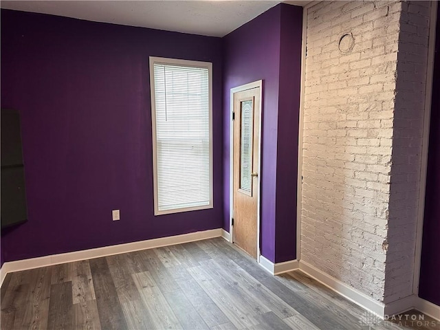 1566 Cora St, Springfield, OH 45503 - unfurnished room with wood finished floors and baseboards