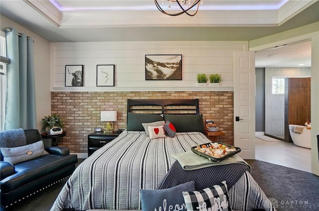 bedroom featuring a tray ceiling