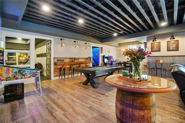rec room with wood finished floors and pool table