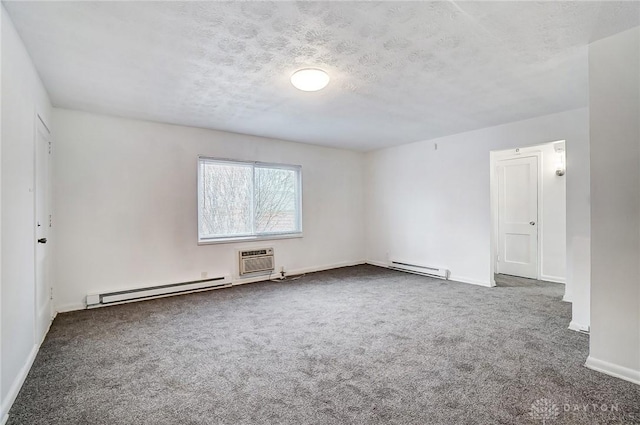 2334 Davue Cir, Dayton, OH 45406 - carpeted empty room with a textured ceiling, baseboards, a wall mounted air conditioner, and a baseboard radiator
