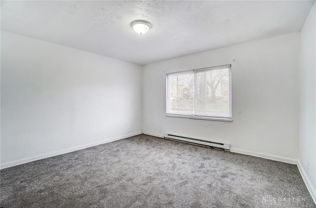 2334 Davue Cir, Dayton, OH 45406 - carpeted empty room featuring baseboards and a baseboard radiator