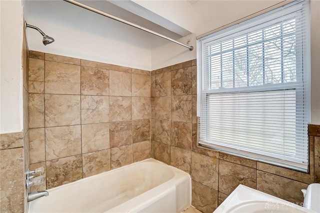 2334 Davue Cir, Dayton, OH 45406 - bathroom with tile walls and shower / bathing tub combination