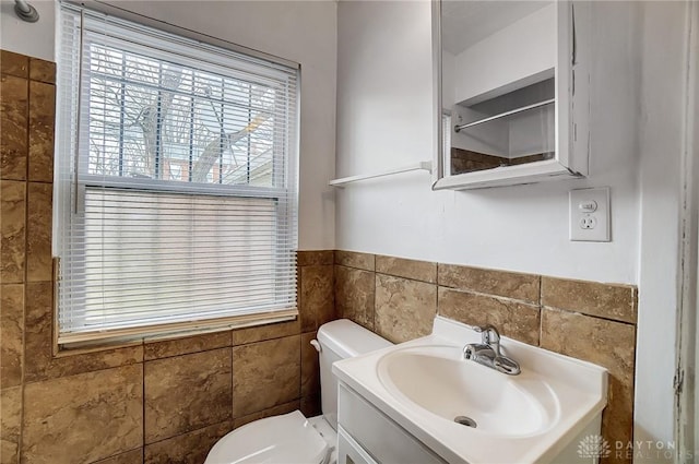 2334 Davue Cir, Dayton, OH 45406 - bathroom with toilet, tile walls, a wainscoted wall, and vanity