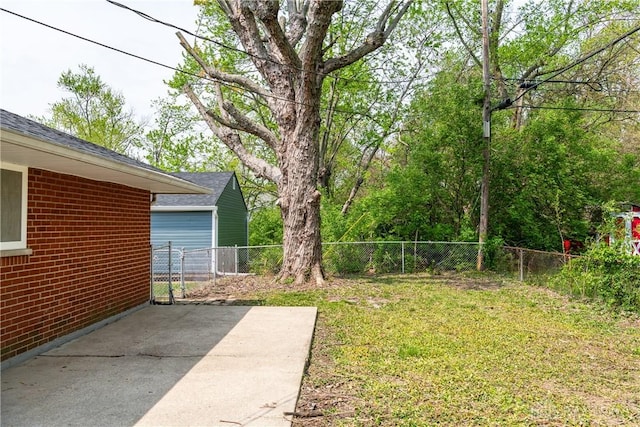 view of yard with a fenced backyard and a patio area