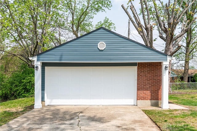 garage with fence