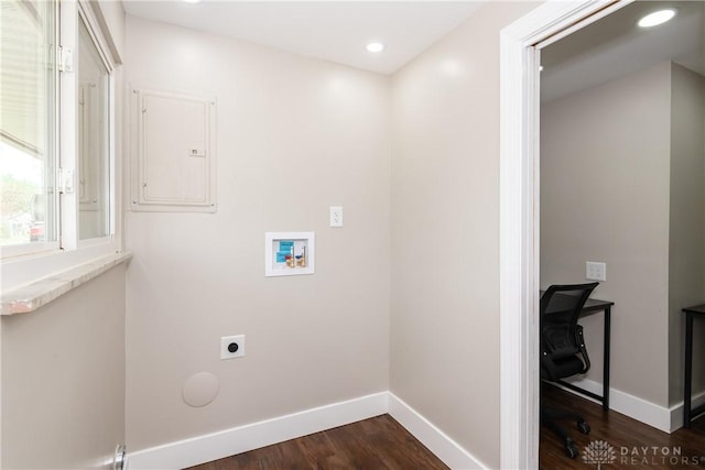 laundry room with washer hookup, baseboards, electric dryer hookup, and dark wood-type flooring
