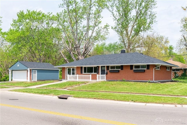 ranch-style home featuring an outdoor structure, a chimney, brick siding, a porch, and a detached garage