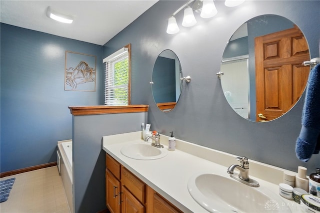 bathroom featuring a sink, a bathing tub, and double vanity