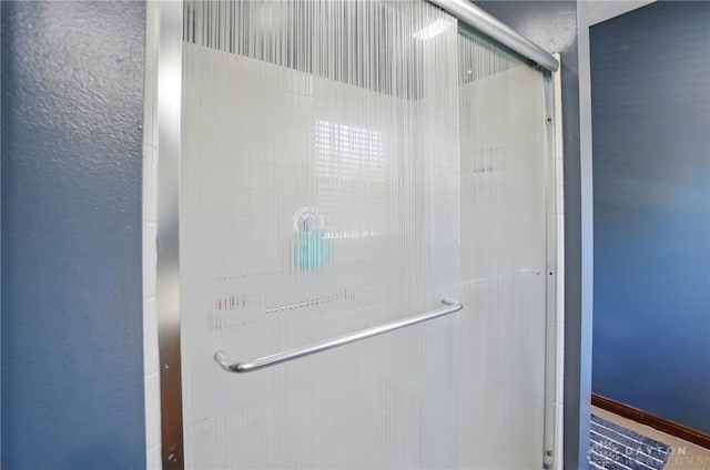 bathroom featuring a stall shower