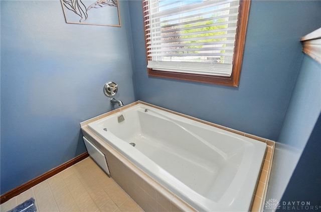 full bath with a garden tub