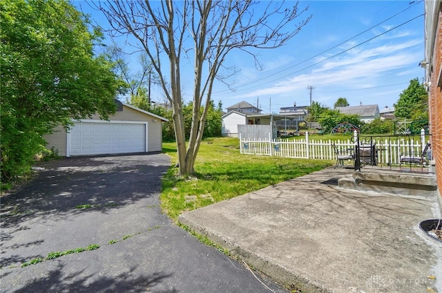 38 Homeview Dr, Harrison Twp, OH 45415 - exterior space featuring fence, an outdoor structure, and a garage