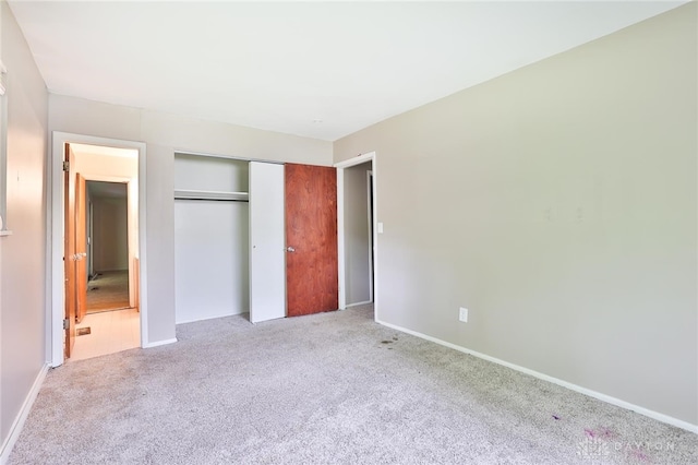 5565 Ehrling Rd, Cincinnati, OH 45227 - unfurnished bedroom with carpet, a closet, and baseboards